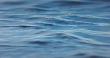 Ripple sea or ocean waves as nature pattern background, 4K slow motion video of water surface